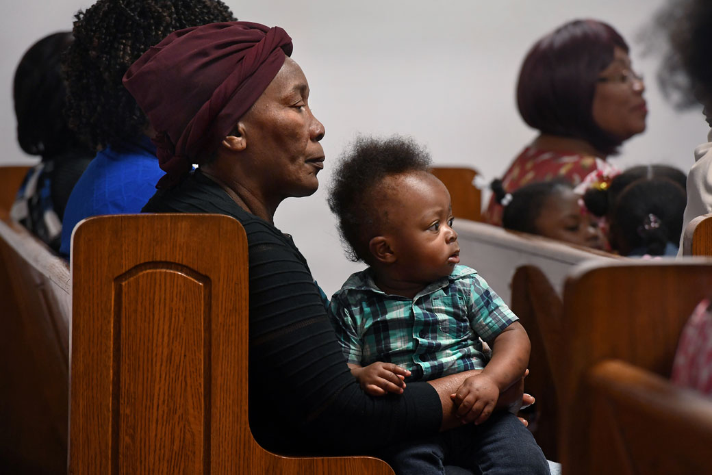 Congregants attend a service at a Haitian church in Mount Olive, North Carolina, where many Haitian TPS beneficiaries live and work, November 2018. (Getty/Michael S. Williamson)