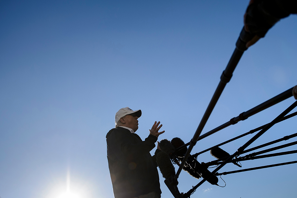 President Donald Trump speaks to the press as he departs the White House in Washington, D.C., on January 10, 2019. (Getty/Brendan Smialowski)