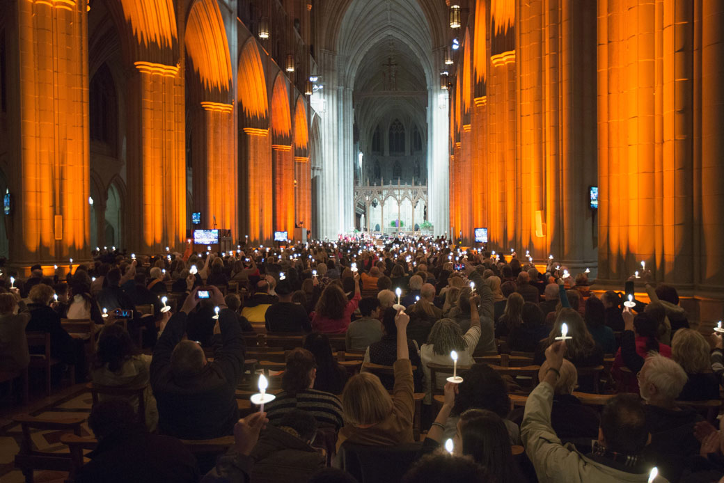 People take part in a candlelight vigil at the Washington National Cathedral in Washington, D.C., March 2018. (Getty/Tasos Katopodis)