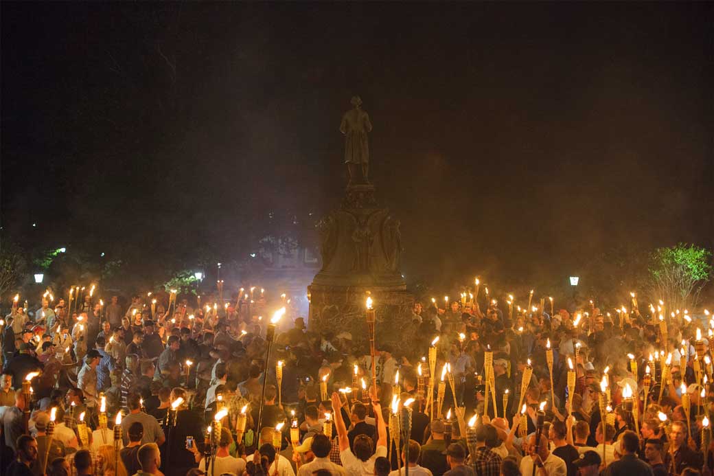 Neo Nazis, alt-right, and white supremacists encircle counterprotestors at the base of a statue of Thomas Jefferson, August 2017. (Getty/Shay Horse)