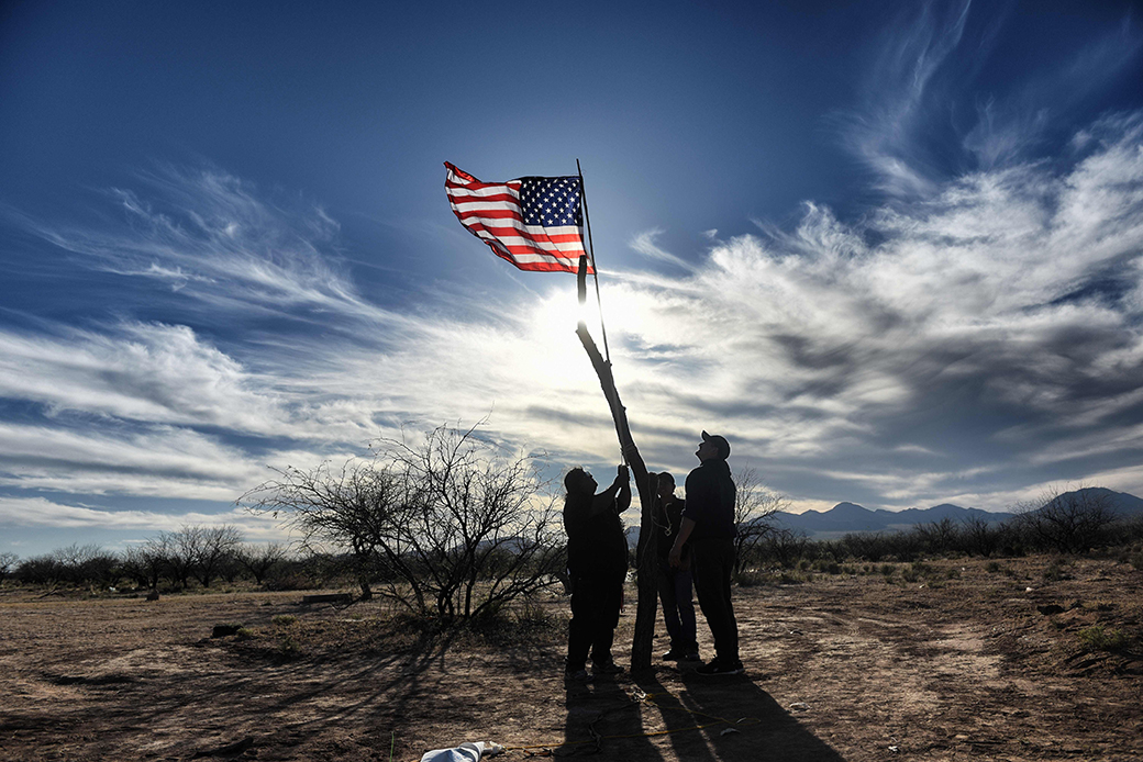 Tohono O'odham people take part in a protest against President Donald Trump's intention to build a new wall in the border between Mexico and the United States, March 25, 2017, in the Altar Desert, in Sonora, Mexico. (Getty/Pedro Pardo)