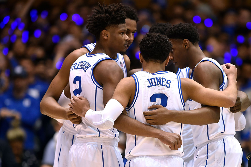 DURHAM, NC - FEBRUARY 20: Cam Reddish #2, Marques Bolden #20, Tre Jones #3, Zion Williamson #1 and RJ Barrett #5 of the Duke Blue Devils huddle against the North Carolina Tar Heels in the first half at Cameron Indoor Stadium on February 20, 2019 in Durham, North Carolina. (Photo by Lance King/Getty Images)