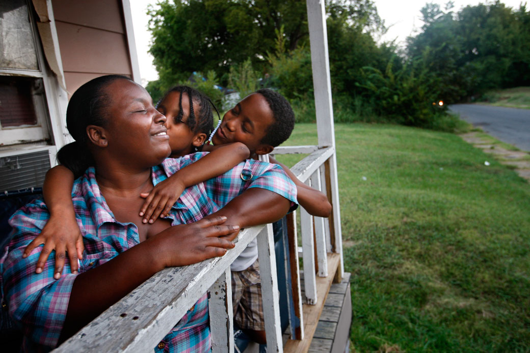 A mother and her two children enjoy a summer evening in Memphis, Tennessee, August 2012. (Getty/Don Bartletti)
