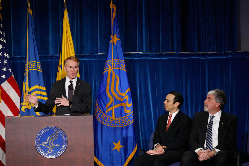OCR Director Roger Severino, center, and then-acting HHS Secretary Eric Hargan, right, watch Sen. James Lankford (R-OK) speak at a news conference announcing the creation of a Conscience and Religious Freedom Division on January 18, 2018, in Washington, D.C. (Getty/Aaron P. Bernstein)