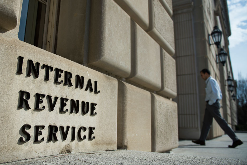 A man walks into the IRS building in Washington, D.C., March 2016. (Getty/AFP/Andrew Caballero-Reynolds)