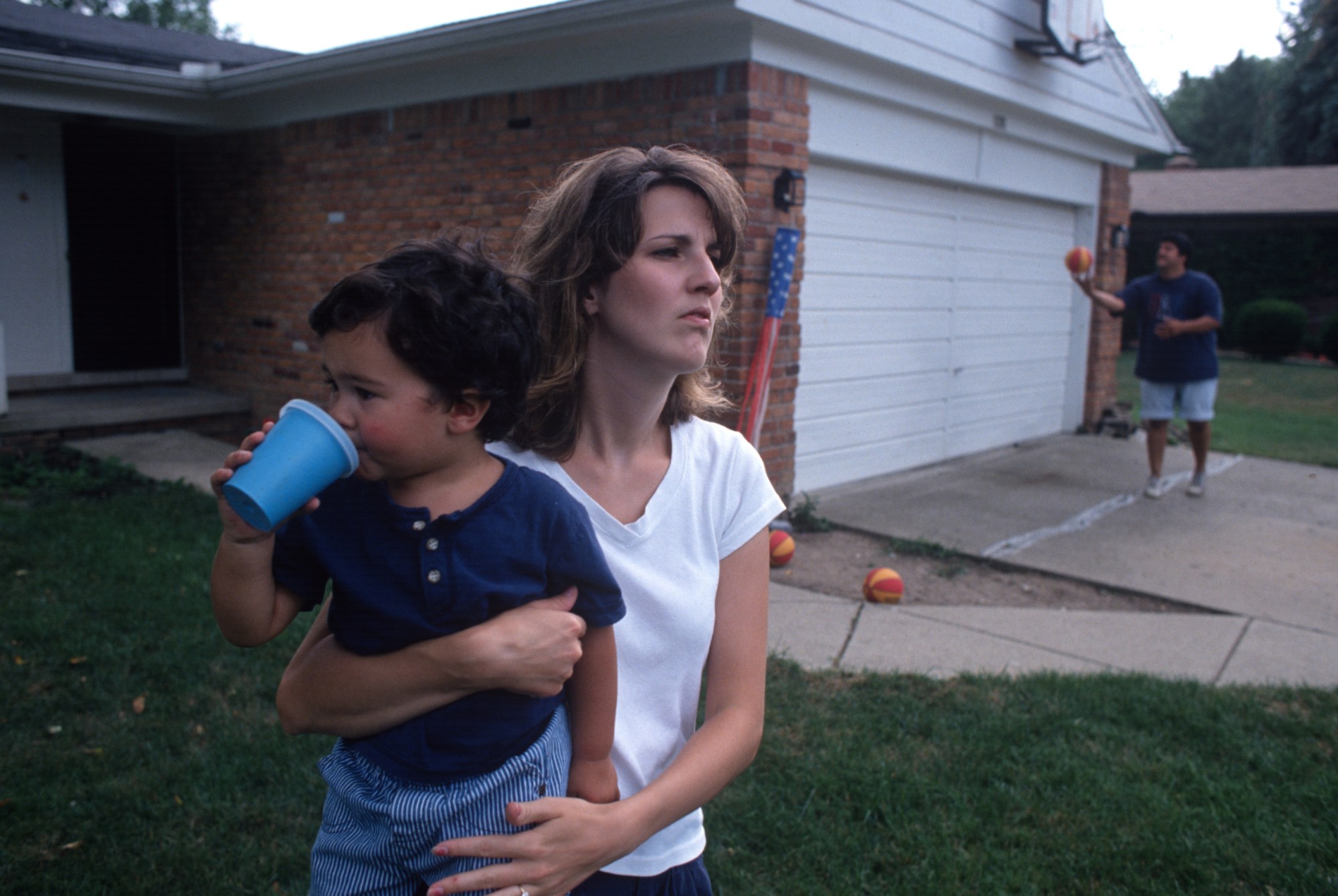 The wife of a striking General Motors assembly line worker worries about the family's economic future on July 8, 1998 in Flint, Michigan. (Getty/ Andrew Lichtenstein)