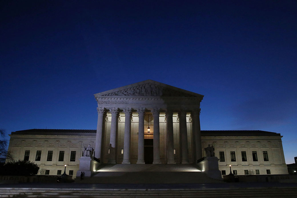 Light reflects off the U.S. Supreme Court building in Washington, D.C., February 2016. (Getty/Mark Wilson)