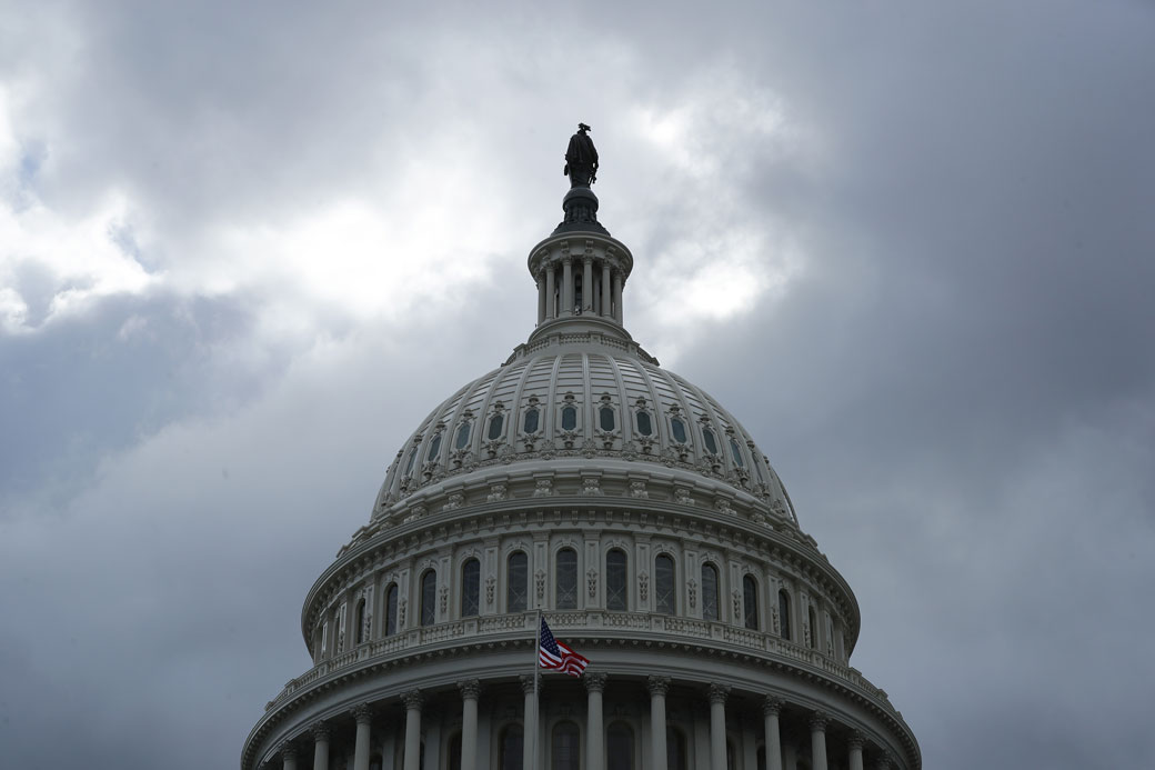 Dark clouds move over the Statue of Freedom on top of the U.S. Capitol Dome, May 2019. (Getty/Chip Somodevilla)