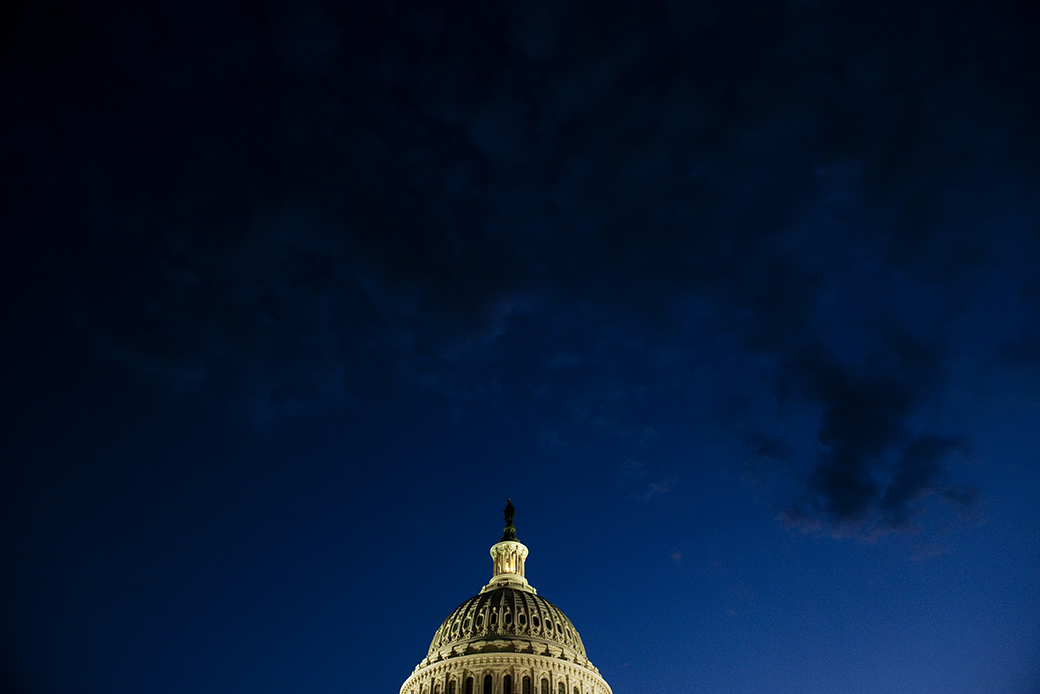 Darkness falls over the Capitol, July 2011, in Washington, D.C. (Getty/Bill Clark)