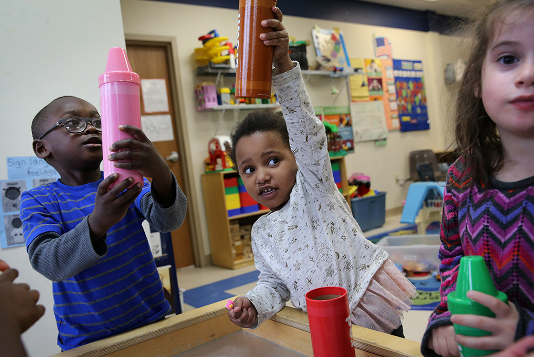 3- and 4-year-olds play a color game at an early education and care agency in Massachusetts, April 2017. (Getty/Craig F. Walker)