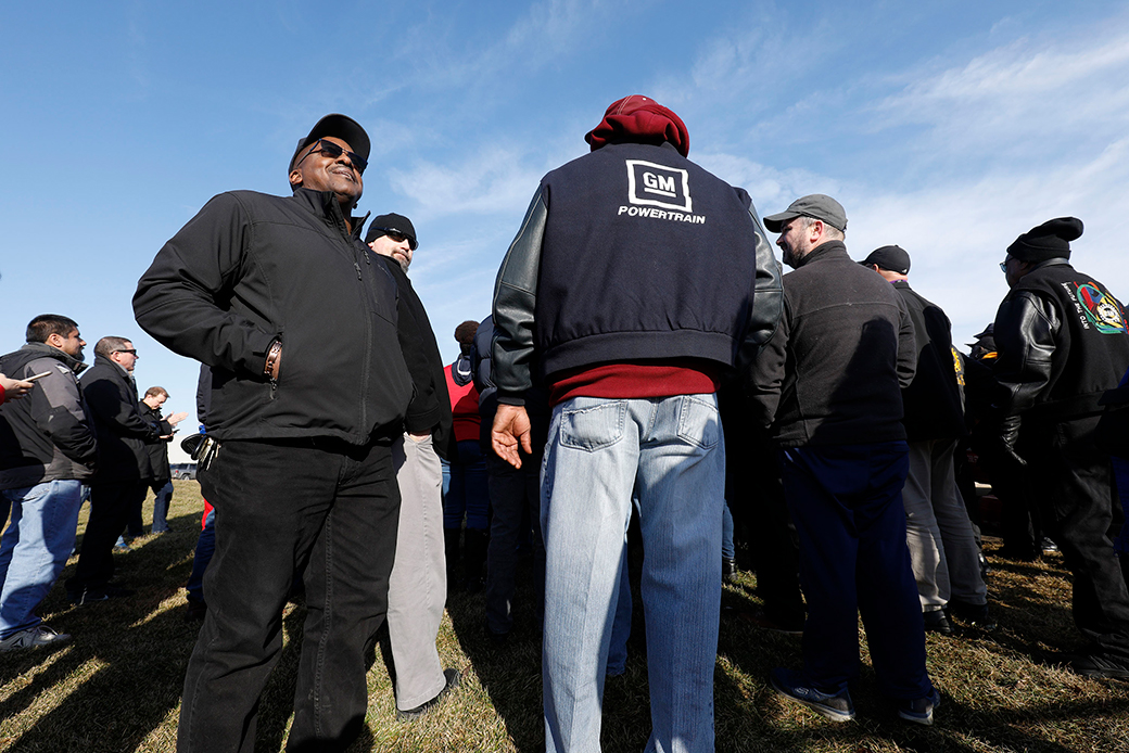  (United Auto Workers members hold a prayer vigil at the General Motors plant in Warren, Michigan, where almost 300 workers will be laid off, February 2019.)