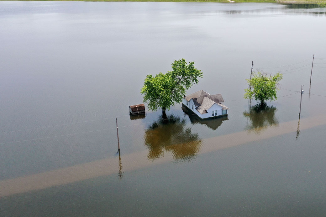 Floodwater from the Mississippi River rises around a home in West Alton, Missouri, June 2019. (Getty/Scott Olson)