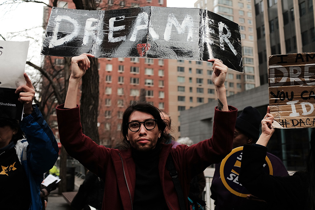 Demonstrators, many of them recent immigrants to America, protest the government shutdown and the lack of a deal on DACA, January 2018, in New York City. (Getty/Spencer Platt)