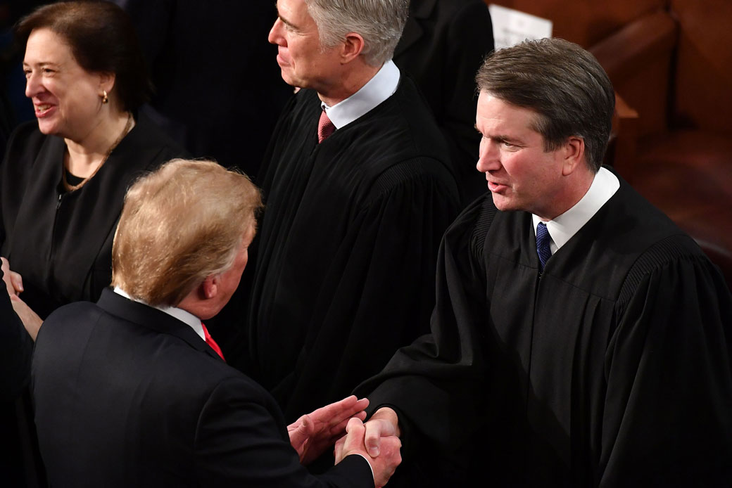President Donald Trump shakes hands with Supreme Court Justice Brett Kavanaugh at the U.S. Capitol in Washington, February 2019. (Getty/Mandel Ngan)