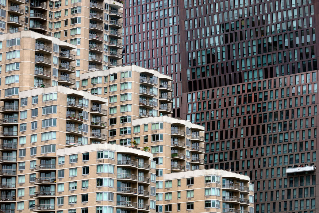 Window cleaners are seen at a high-rise building in New York City, August 2019. (Getty/Johannes Eisele)