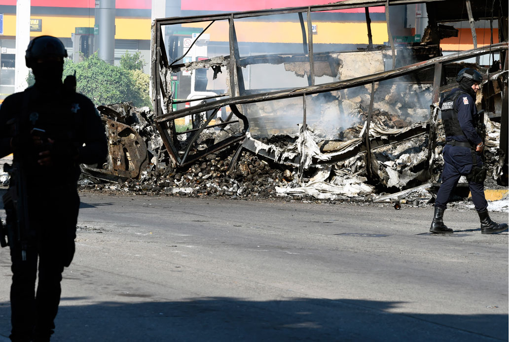 A burnt vehicle is seen in Culiacán, Sinaloa state, Mexico, after Sinaloa cartel members waged a gun battle against Mexican security forces following the arrest of Joaquin 