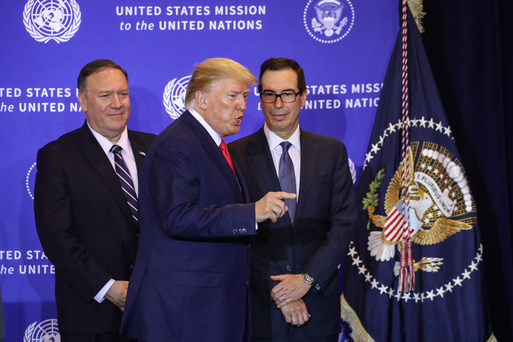 U.S. President Donald Trump is flanked by Secretary of State Mike Pompeo and Secretary of the Treasury Steven Mnuchin during a press conference in which he defended his July 25 phone call with Ukrainian President Volodymyr Zelensky, New York City, September 25, 2019. (Getty/Bloomberg/Victor J. Blue)