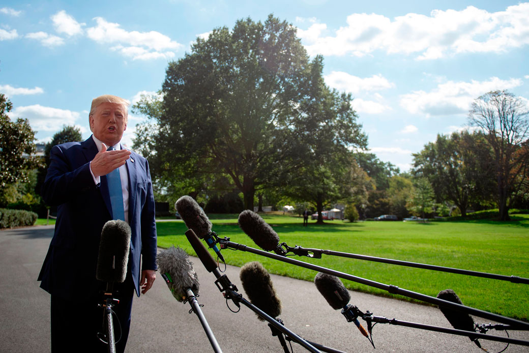 U.S. President Donald Trump speaks to the press as he departs the White House in Washington, D.C., on October 4, 2019. (Getty/AFP/Andrew Caballero-Reynolds)