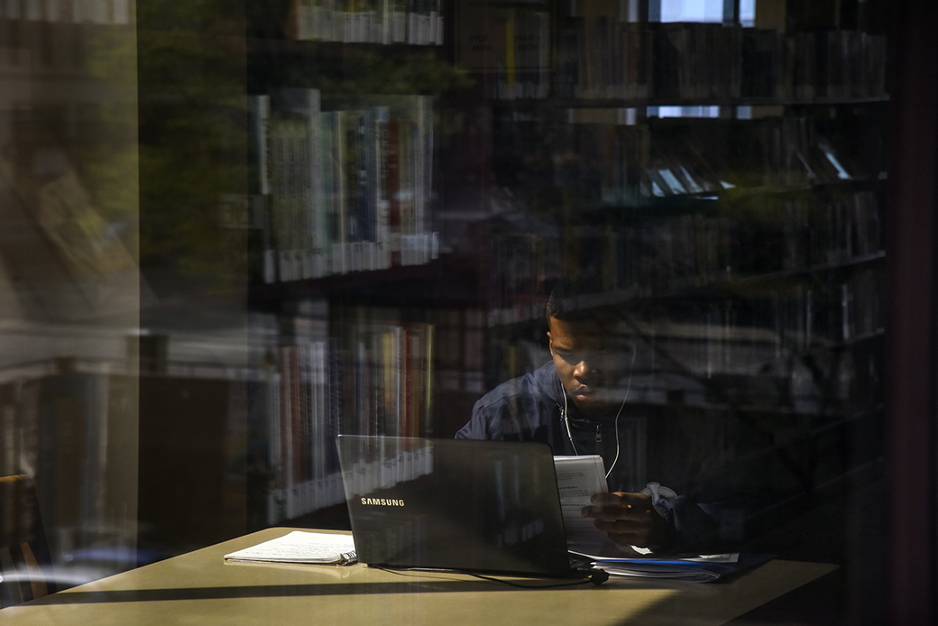 After the fourth and final day of a job training program, a participant sits in the downtown public library on May 3, 2018, in Omaha, Nebraska. (Getty/Jahi Chikwendiu)