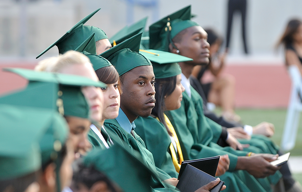 High school students sit for their commencement ceremony in Long Beach, California, June 2009. (Getty/Jeff Gritchen)