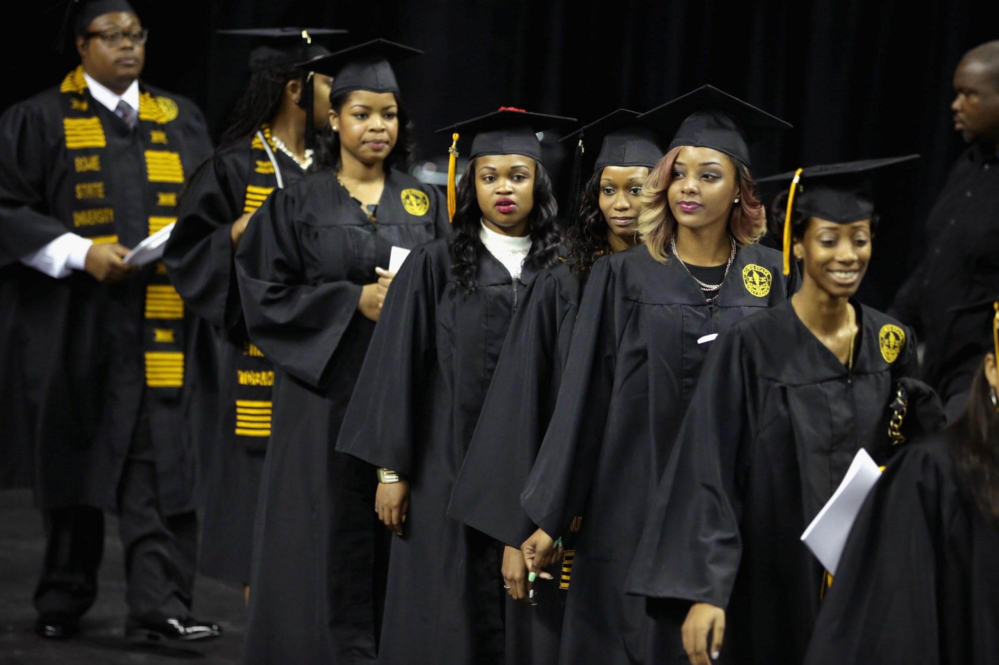 COLLEGE PARK, MD - MAY 17: Graduates of Bowie State University arrive for the school's graduation ceremony at the Comcast Center on the campus of the University of Maryland May 17, 2013 in College Park, Maryland. First lady Michelle Obama delivered the commencement speech for the 600 graduates of Maryland's oldest historically black university and one of the ten oldest in the country. (Photo by Chip Somodevilla/Getty Images)