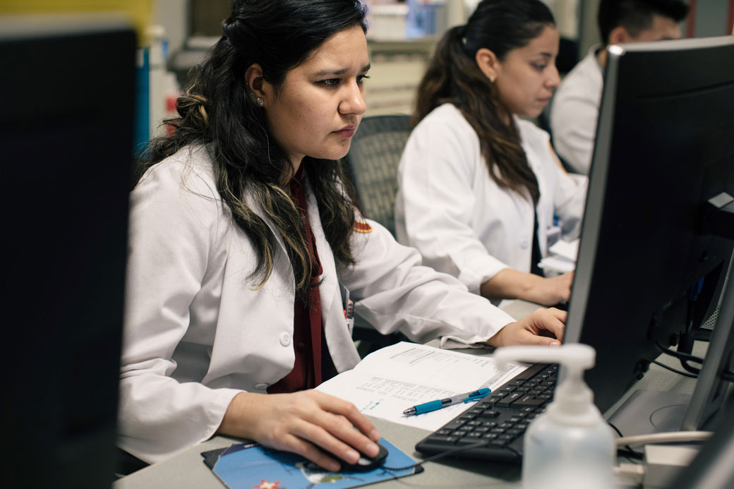 A fourth-year medical student works at Loyola University Chicago's Stritch School of Medicine, February 2018. (Getty/The Washington Post)