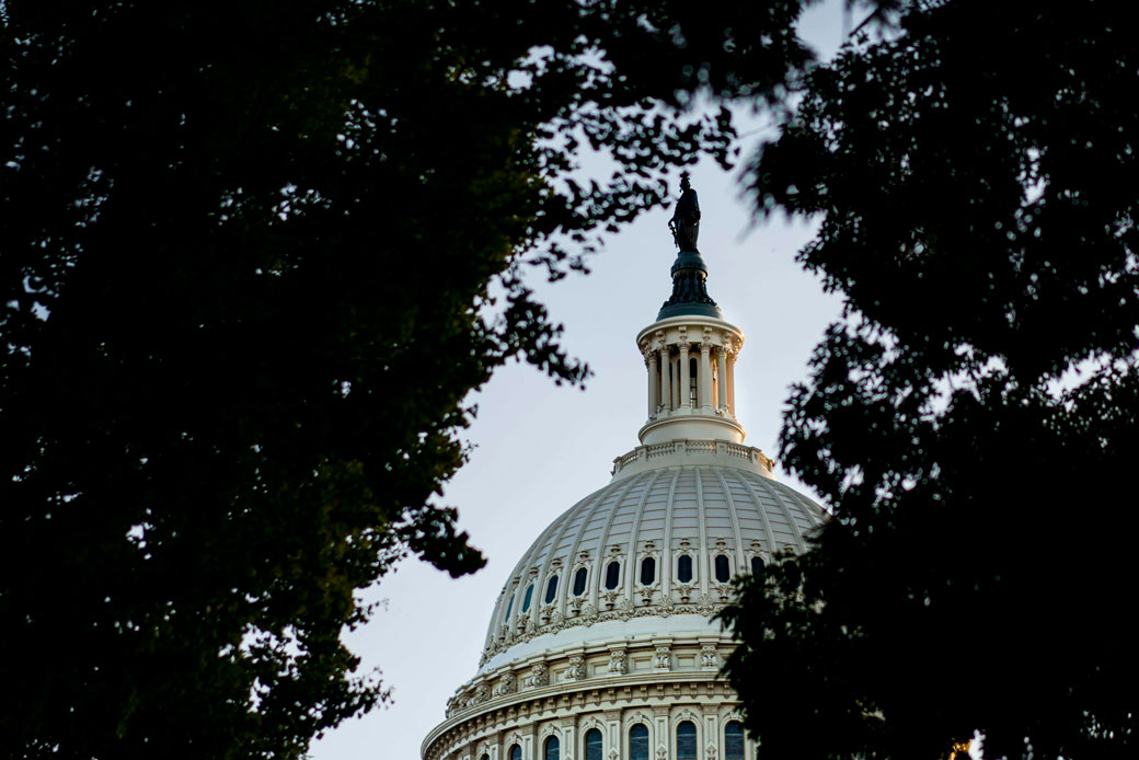 The sun sets on the U.S. Capitol Dome, October 2019. (Getty/Melina Mara)