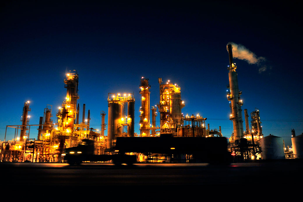 An oil refinery lights up the night sky in Three Rivers, Texas. (Getty/The Washington Post/Michael S. Williamson)