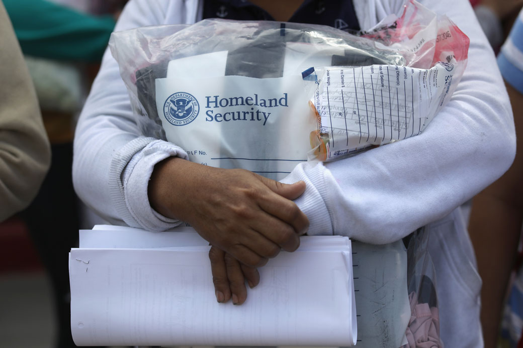 Central American immigrants depart ICE custody, pending future immigration court hearings in June 2018, McAllen, Texas. (Getty/John Moore)