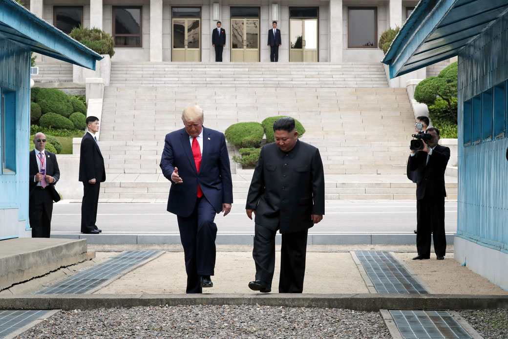 U.S. President Donald Trump and North Korean leader Kim Jon Un meet inside the Demilitarized Zone (DMZ) separating South and North Korea, on June 30, 2019. (Getty/Dong-A Ilbo)