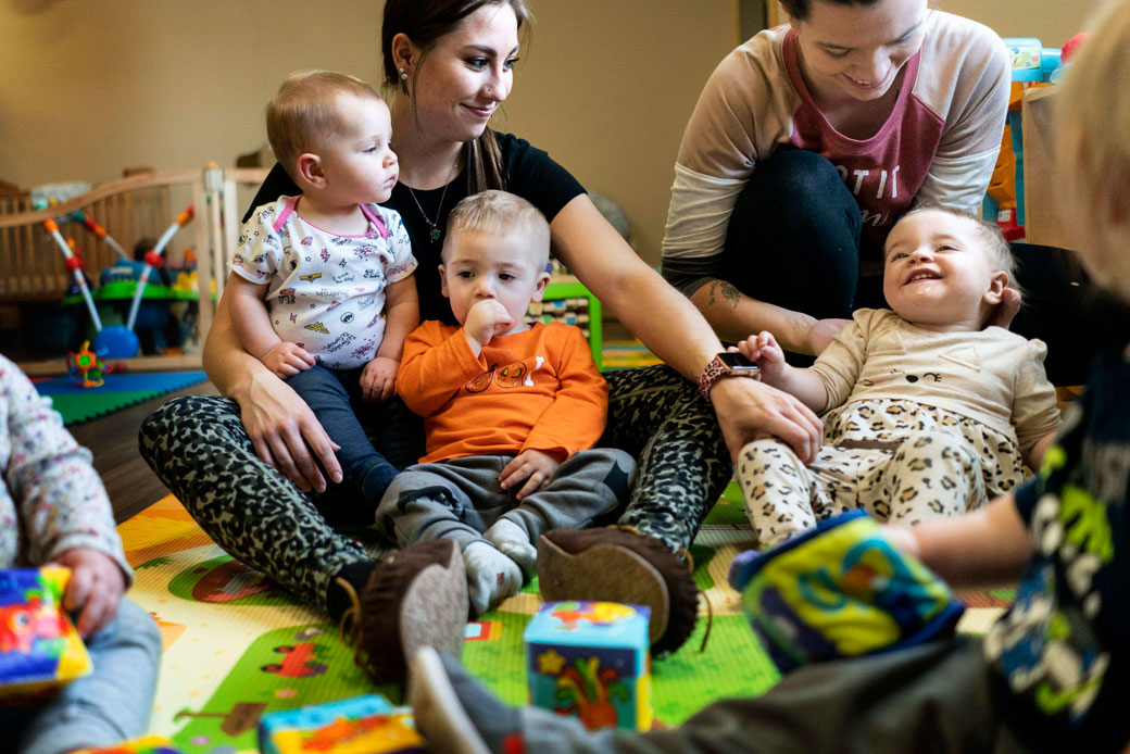 Teachers and infants sing songs at a child care center in Mountain Iron, Minnesota, October 2019. (Getty/The Washington Post/Melina Mara)