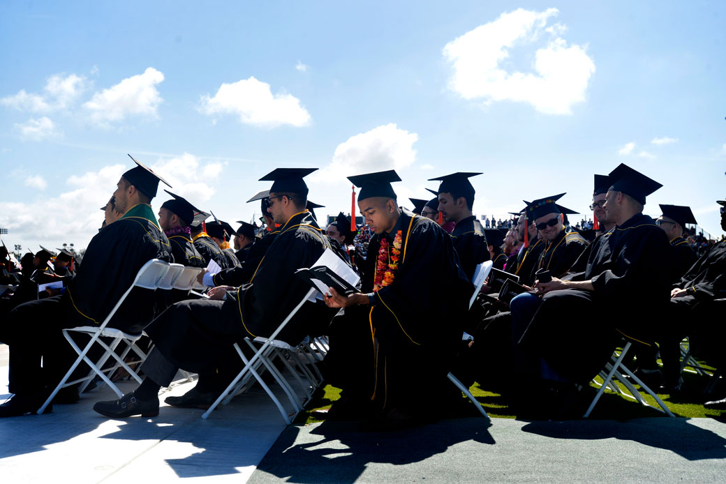 College graduates in Long Beach, California, wait their turn to walk the stage, May 2019. (Getty/Brittany Murray)
