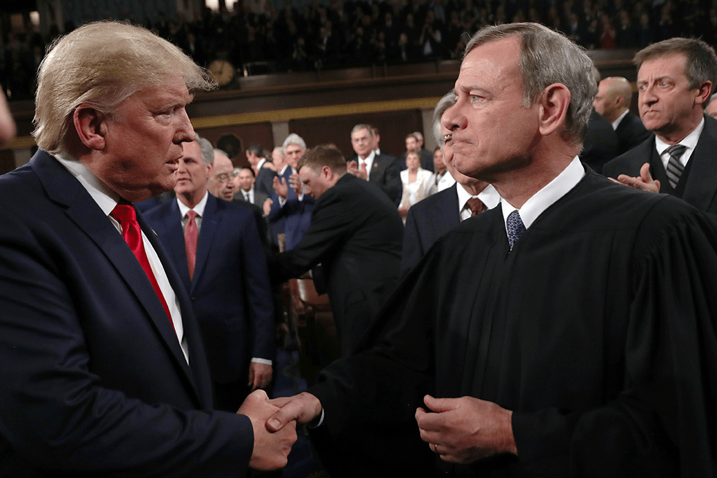 President Donald Trump shakes hands with Chief Justice John Roberts before the State of the Union address, February 2020. (Getty/Leah Millis-Pool)