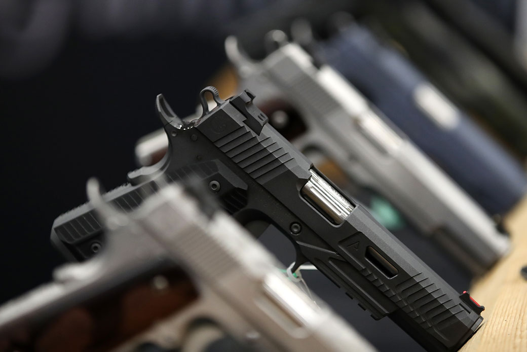 Handguns are displayed during the 2018 NRA Annual Meeting and Exhibits in Dallas. (Getty/Justin Sullivan)