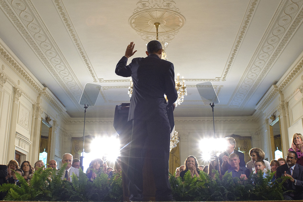 Then-President Barack Obama waves after speaking at an event on the 90-day anniversary of the signing of the Affordable Care Act, June 22, 2010, in the East Room of the White House. (Getty/Mandel Ngan)