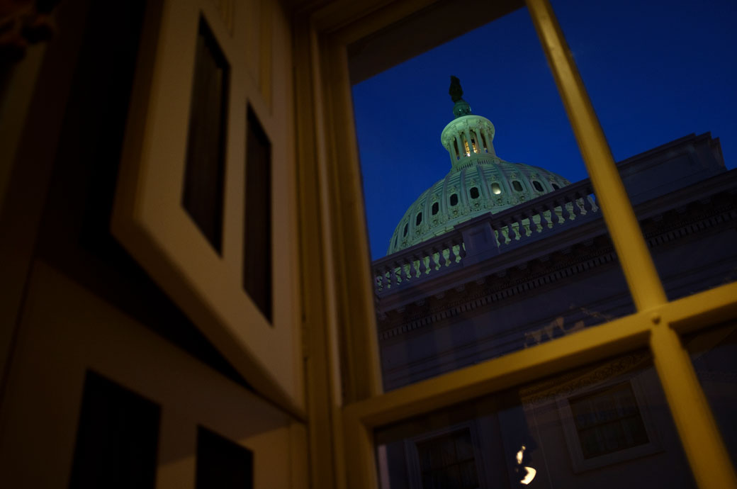 The U.S. Capitol dome is seen at dusk from a hallway, January 2020. (Getty/Drew Angerer)