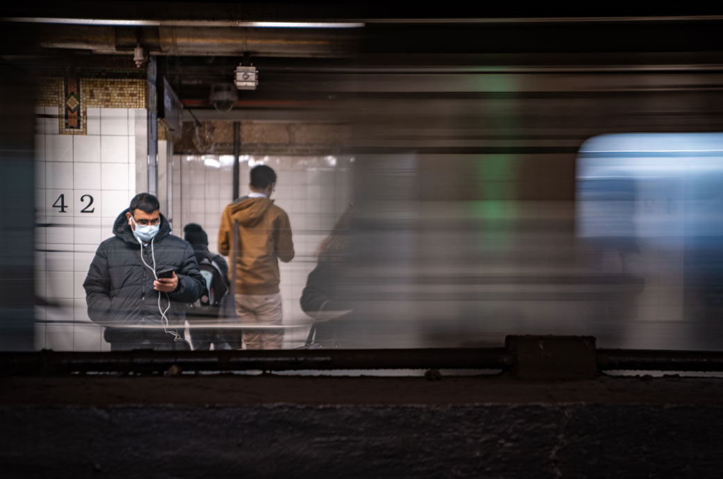 A traveler wears a medical mask at Grand Central Terminal, March 2020. (Getty/David Dee Delgado)