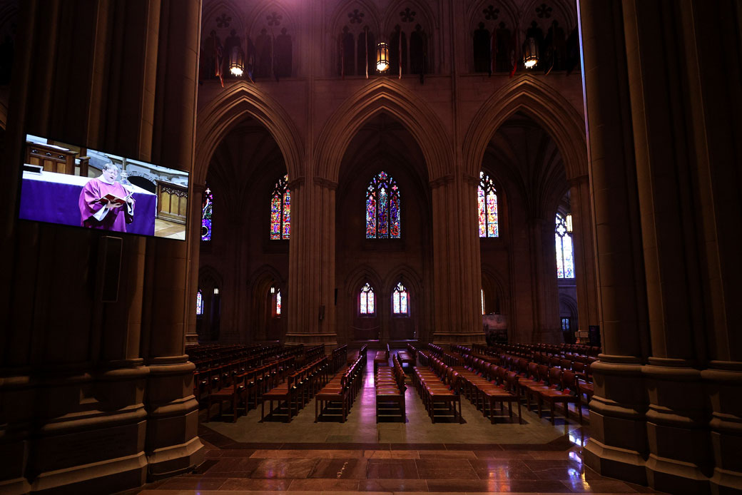 Unoccupied seats are seen as Sunday Mass at the National Cathedral in Washington, D.C., is live-webcast due to the coronavirus, March 22, 2020. (Getty/Patrick Smith)