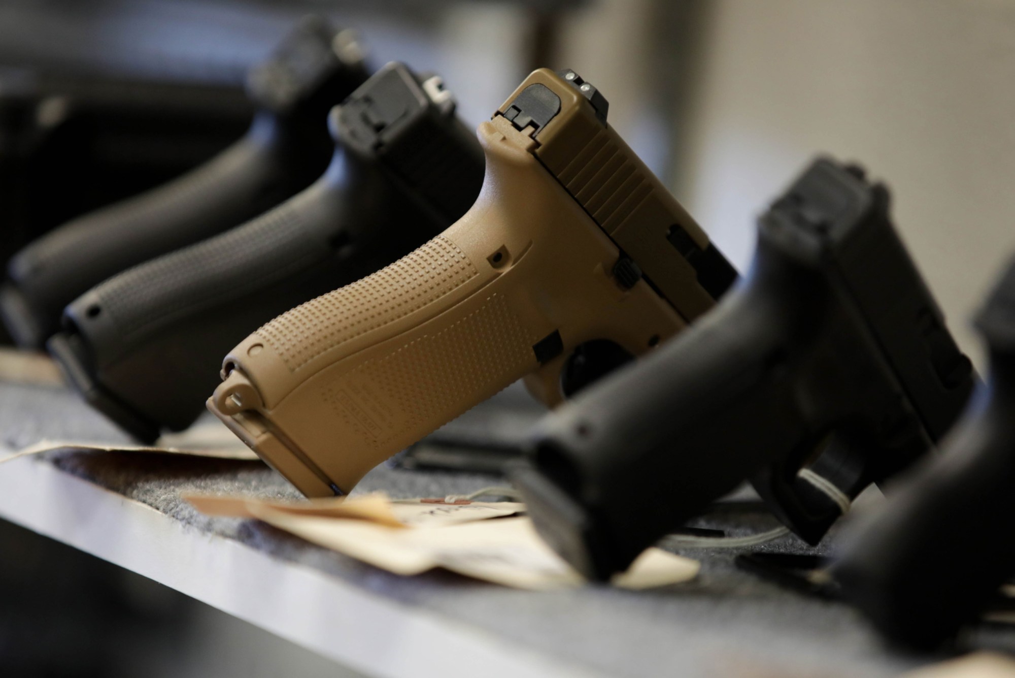 Weapons are on display at a gun shop in Manassas, Virginia, following an increase in gun and ammunition sales amid the COVID-19 pandemic, March 2020. (Getty/Anadolu Agency/Yasin Ozturk)