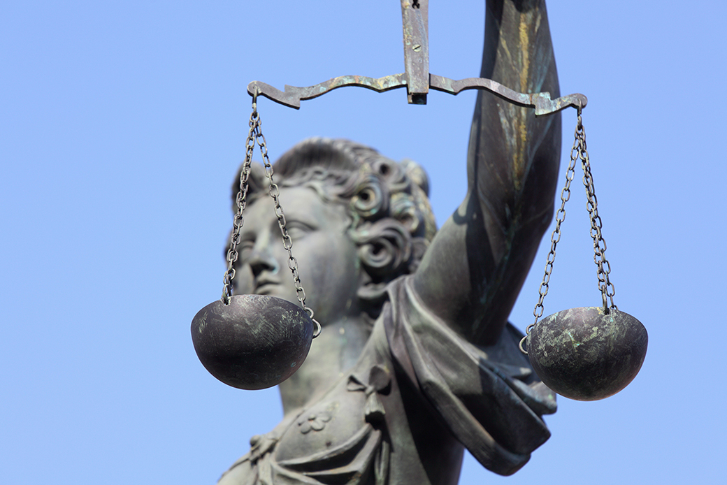 Pictured is a 300-year-old statue of Lady Justice overseeing the Well of Justice in Frankfurt, Germany. (Getty)