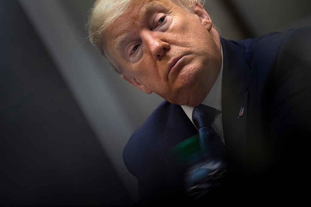 President Donald Trump looks on after a meeting on the coronavirus, with members of the insurance industry and Vice President Mike Pence, in the Roosevelt Room of the White House, March 10, 2020. (Getty/Brendan Smialowski)