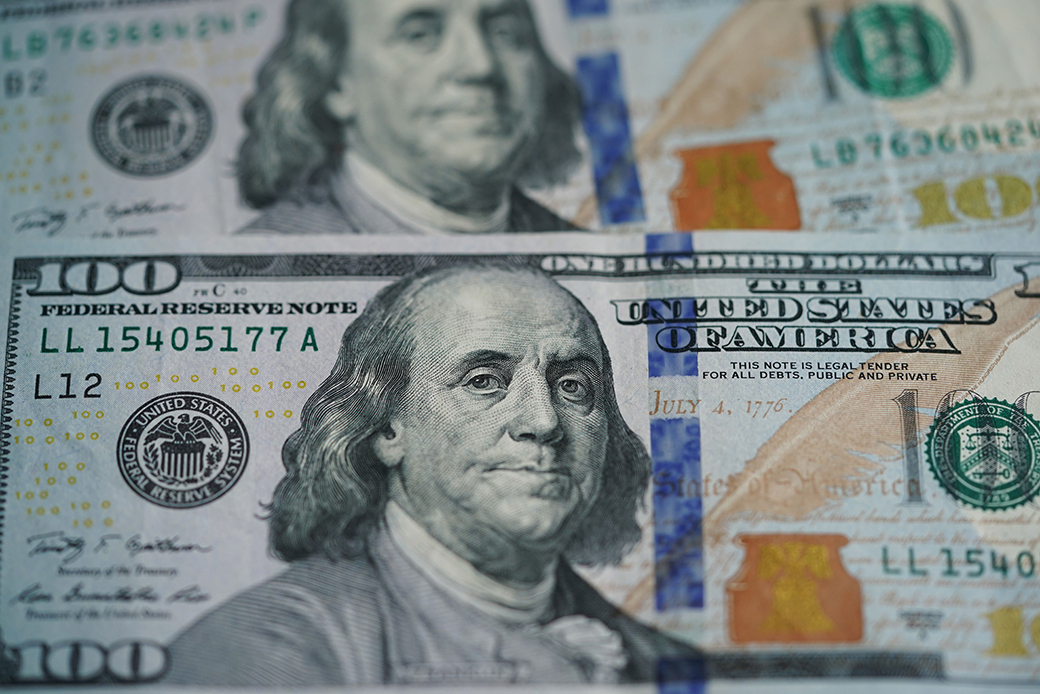 U.S. dollar banknotes are shown in Washington, D.C., March 2020. (Getty/Liu Jie)
