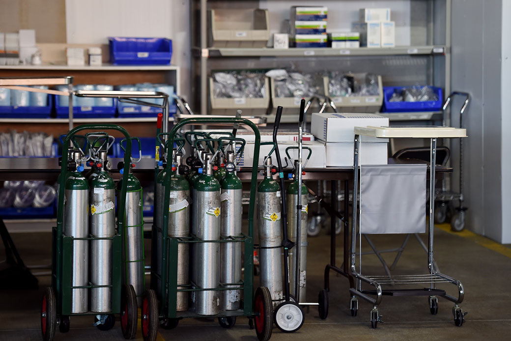 Medical supplies sit on shelves at an indoor parking lot adjacent to a hospital in Fredericksburg, Virginia, as the state prepares for the fight against the coronavirus pandemic, April 2020. (Getty/Olivier Douliery/AFP)