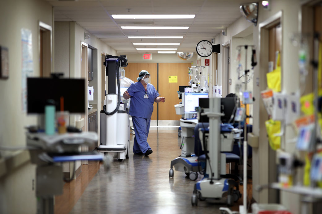 Radiologists prepare to take an X-ray image in a COVID-19 patient's room in the intensive care unit of MedStar St. Mary's Hospital in Leonardtown, Maryland, April 14, 2020. (Getty/Win McNamee)