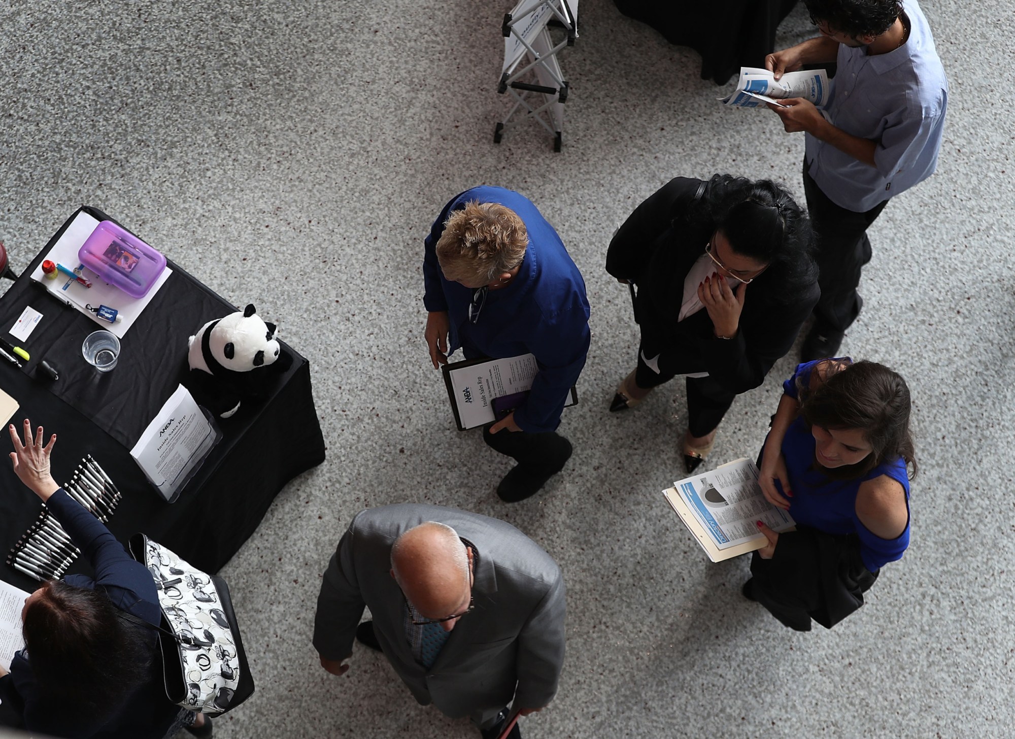 People attend the JobNewsUSA job fair at the BB&T Center on November 15, 2016 in Sunrise, Florida. (Getty/Joe Raedle)