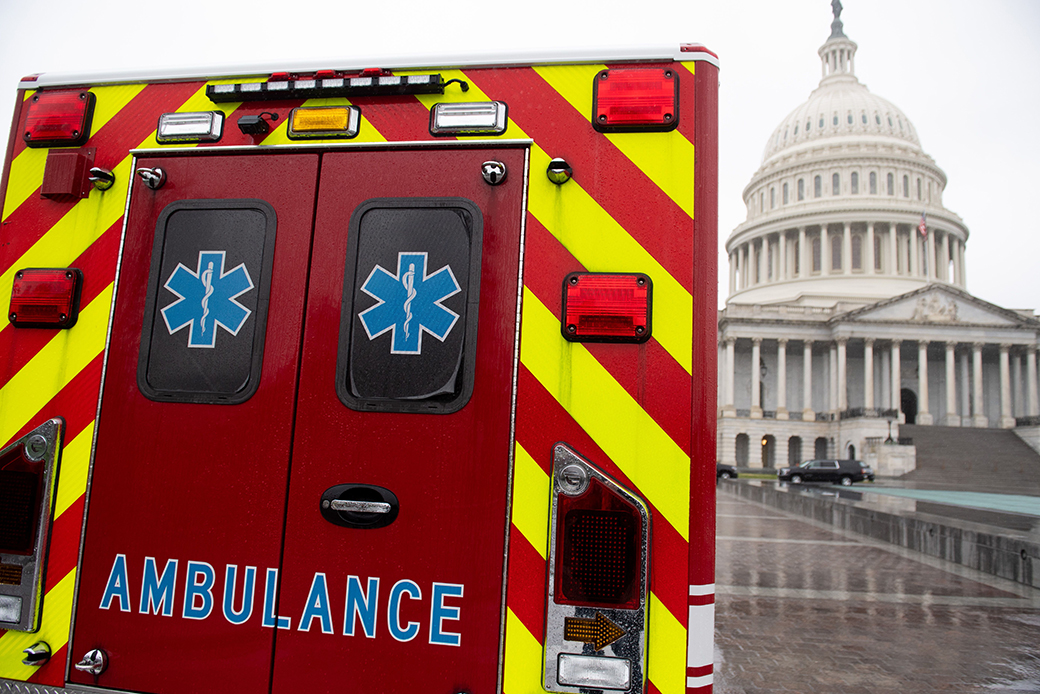 An ambulance sits outside the U.S. Capitol in Washington, D.C., March 23, 2020, as the Senate negotiates a COVID-19 relief package. (Getty/Saul Loeb)