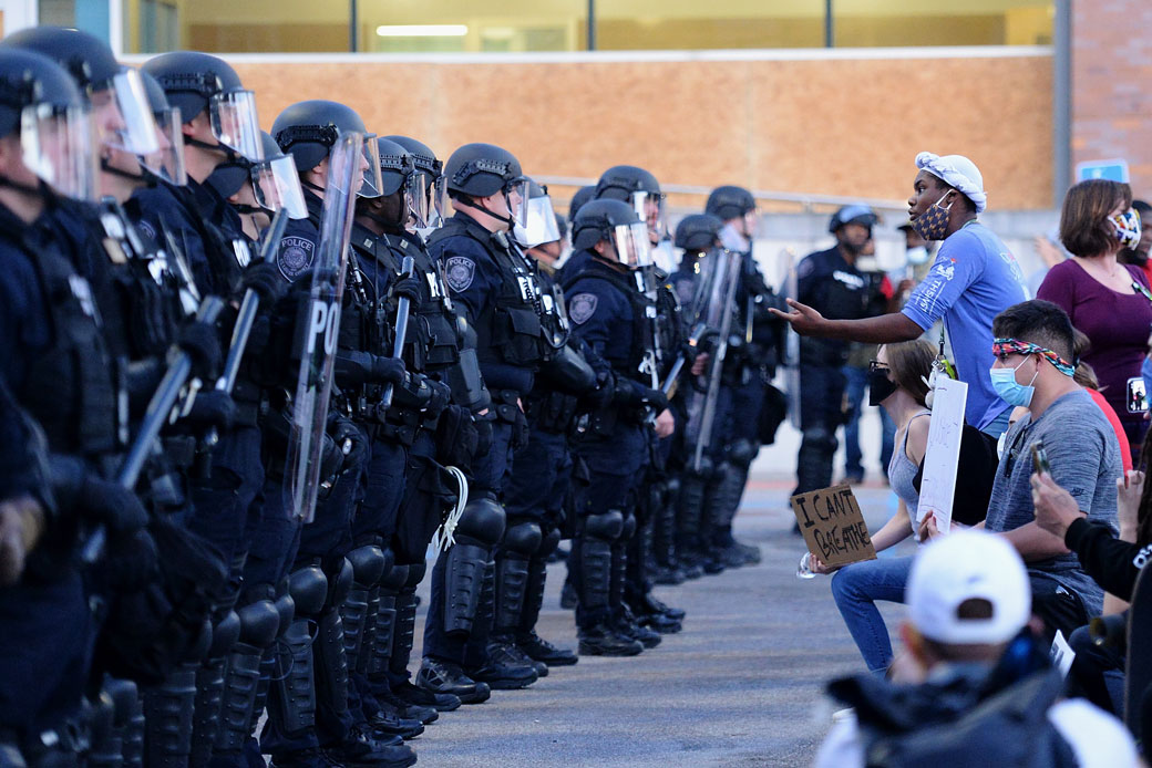 A protestor faces off with law enforcement during a protest on May 31, 2020, in Ferguson, Missouri. (Getty/Michael B. Thomas)