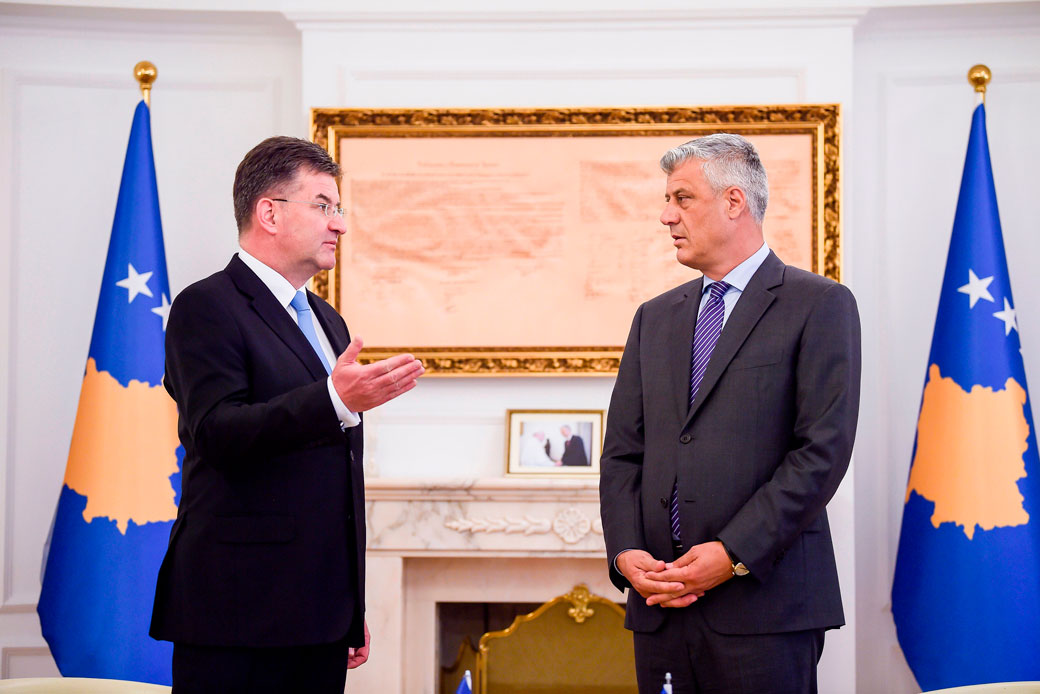 Miroslav Lajcak, the EU special representative for the Pristina-Belgrade dialogue, left, and Kosovo President Hashim Thaci chat following their meeting in Pristina, Kosovo, on June 16, 2020. (Getty/Armend Nimani/AFP)