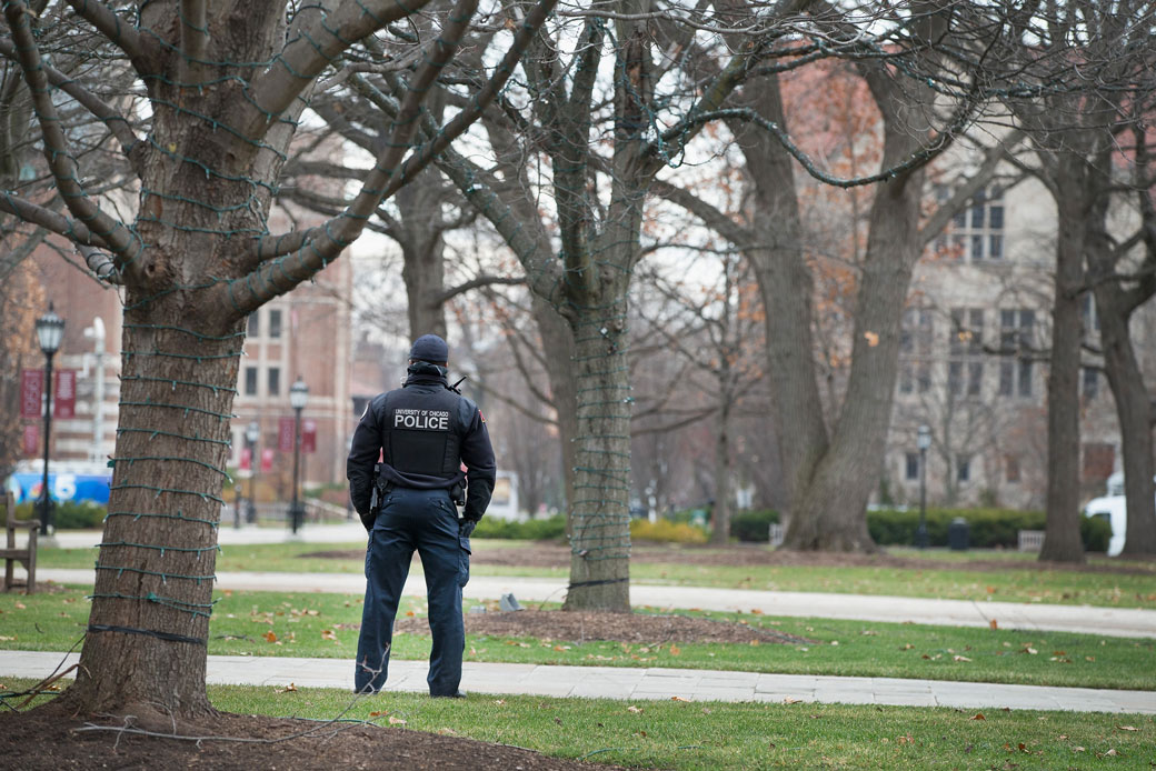 A police officer stands watch on a college campus in Chicago on November 30, 2015. (Getty/Scott Olson)