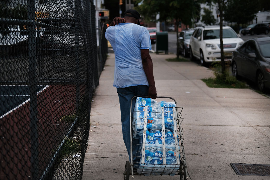 Residents of Newark, New Jersey, receive free water after lead was found in the tap water in August 2019. (Getty/Spencer Platt)